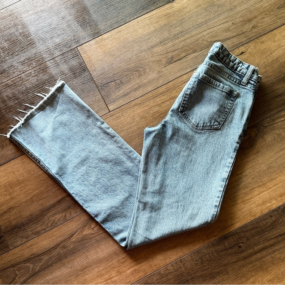 Women’s Raw Hem Light Wash Boot Cut Jeans
